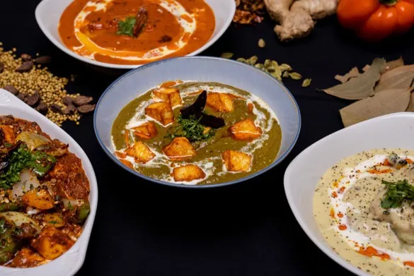 Palak paneer, creamy korma and tomato-based North Indian curries with whole spices at Shehnai Restaurant, Hamilton
